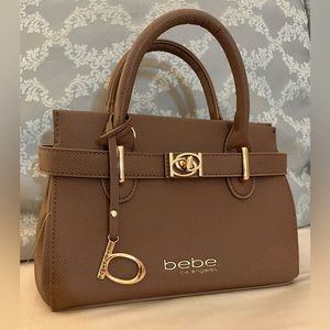 bebe Los Angeles brown/pink tiny hand bag